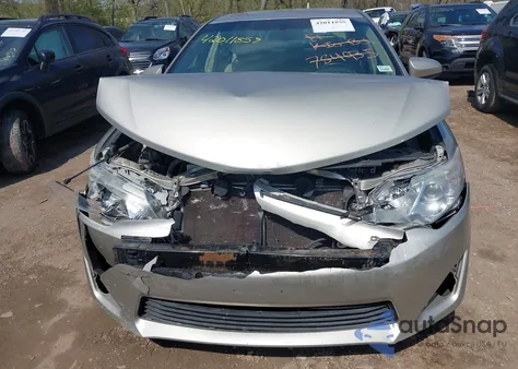 2014 Toyota Camry Le z USA, uszkodzony, nr VIN 4T1BF1FK3EU784935